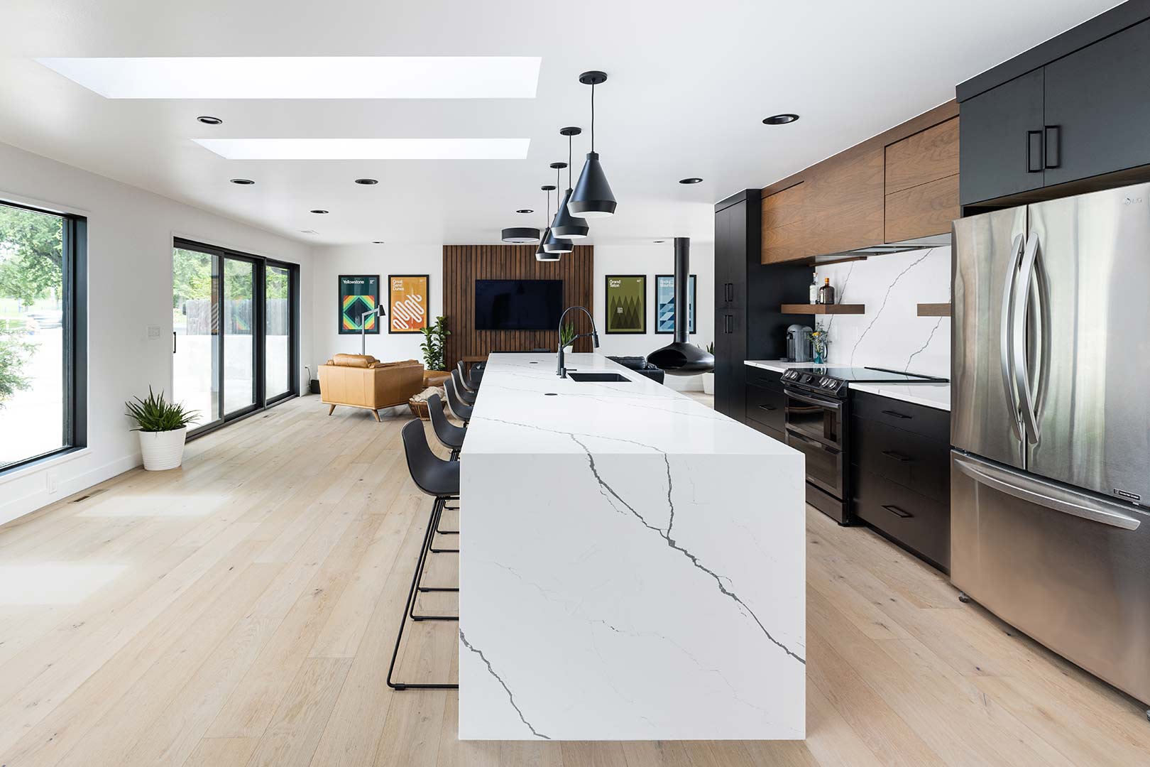 Detailed image featuring the quartz countertop waterfall edge of the kitchen island.