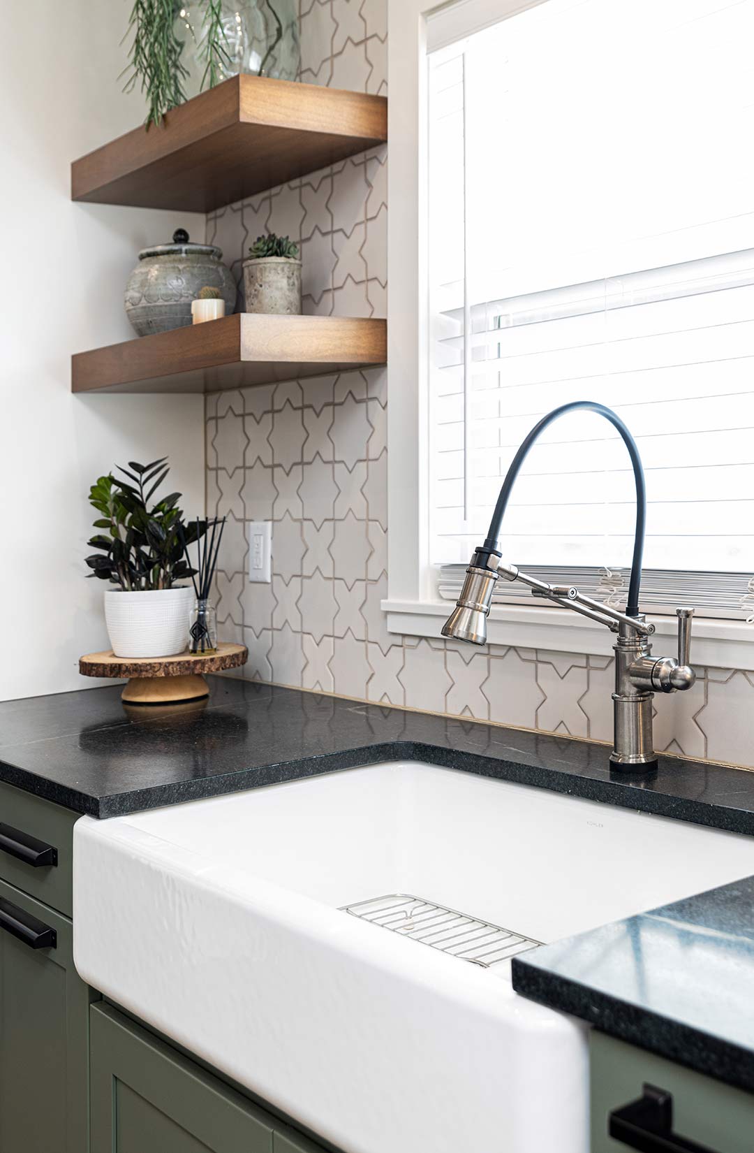 Detailed image of apron sink with an industrial farmhouse faucet in Fort Collins Colorado